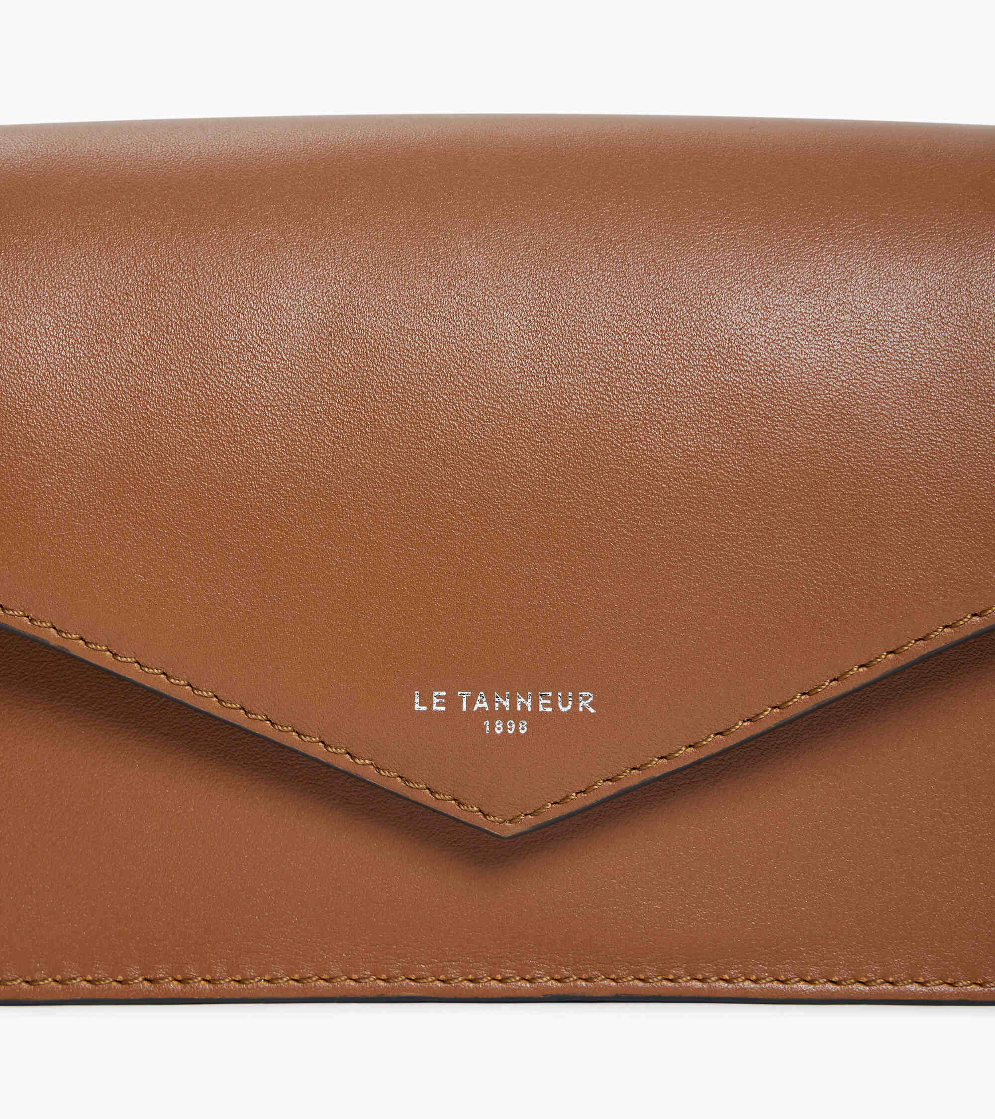 Sac pochette avec bandoulière en cuir lisse